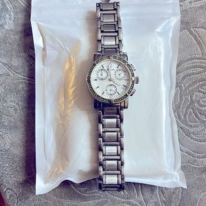 Silver Bulova women’s watch. Just needs new battery